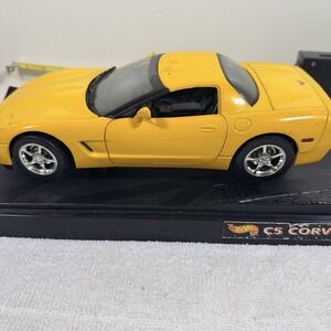 HOT WHEELS ELITE CORVETTE Z06 YELLOW 1/18 SCALE STAND NO BOX